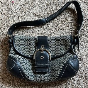 Black and gray coach purse